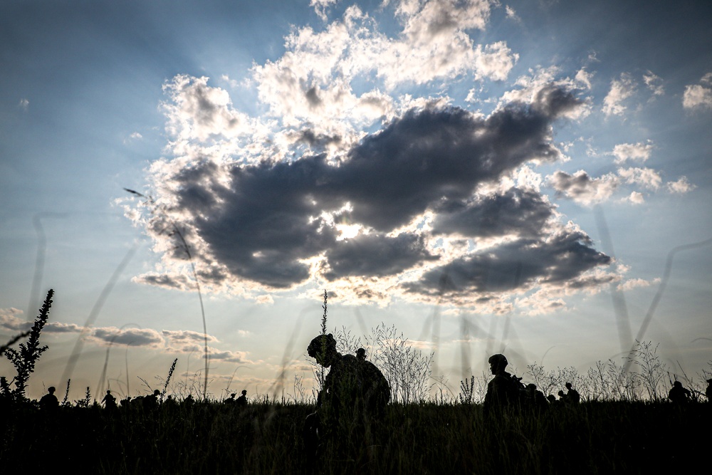 Paratroopers Conduct Load Up Onto Helicopter In Preparation For Air Assault