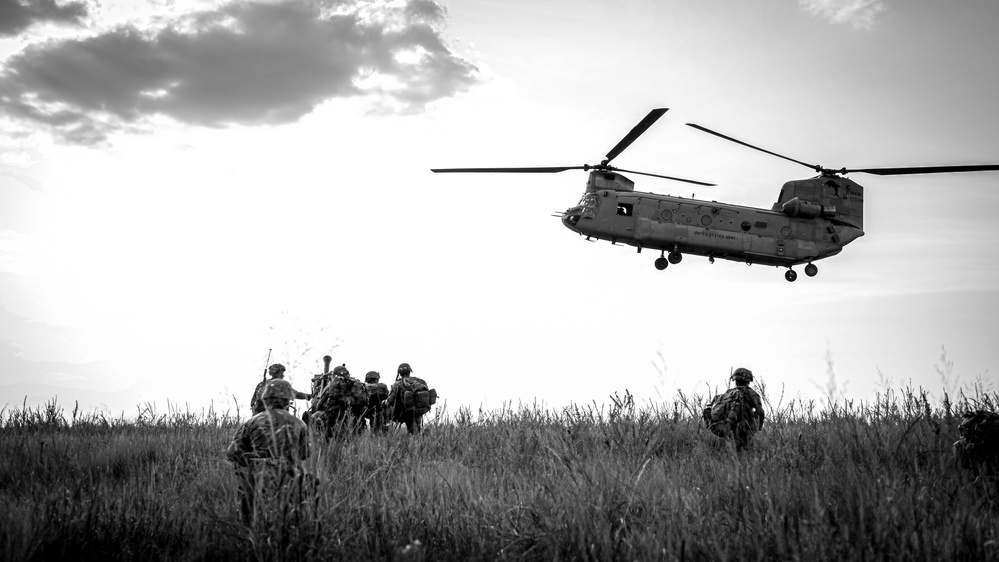 Paratroopers Conduct Load Up Onto Helicopter In Preparation For Air Assault