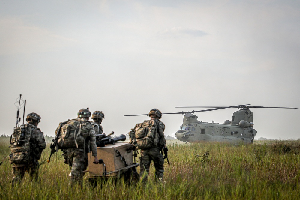 Paratroopers Conduct Load Up Onto Helicopter In Preparation For Air Assault