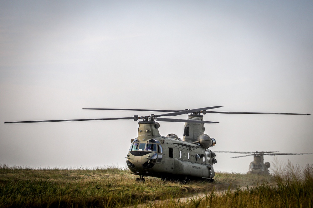 Paratroopers Conduct Load Up Onto Helicopter In Preparation For Air Assault