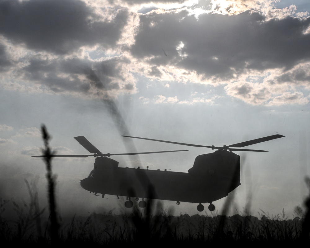 Paratroopers Conduct Load Up Onto Helicopter In Preparation For Air Assault