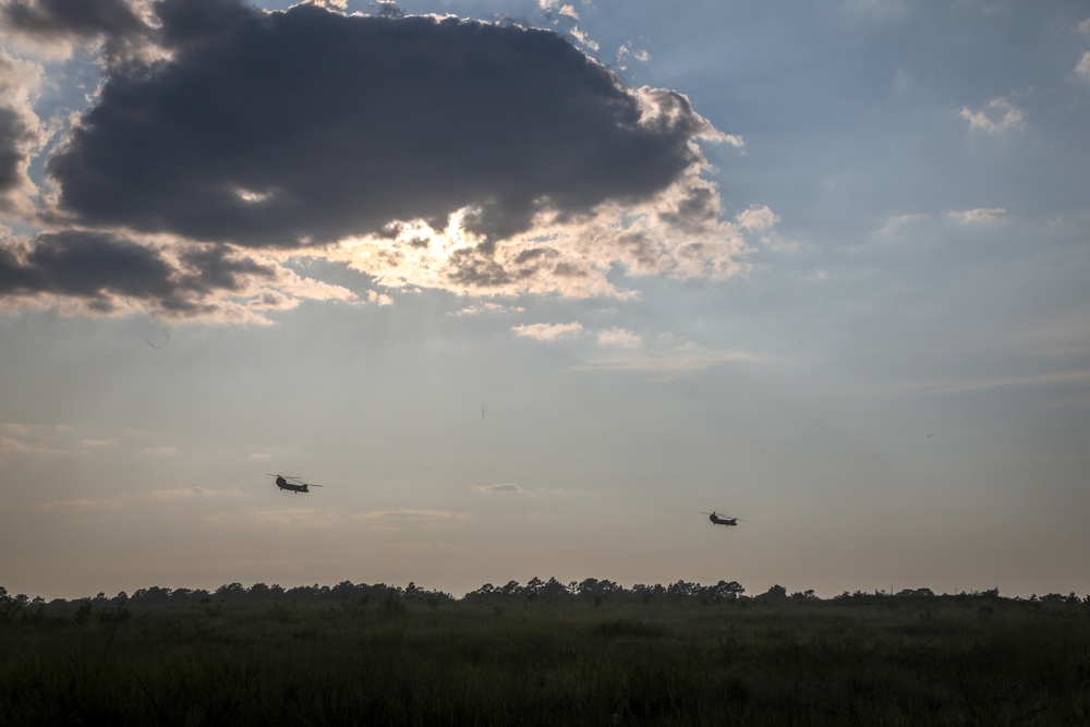 Paratroopers Conduct Load Up Onto Helicopter In Preparation For Air Assault