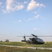 Paratroopers Conduct Load Up Onto Helicopter In Preparation For Air Assault