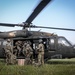 Paratroopers Conduct Load Up Onto Helicopter In Preparation For Air Assault