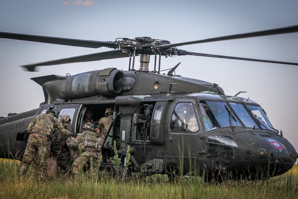 Paratroopers Conduct Load Up Onto Helicopter In Preparation For Air Assault