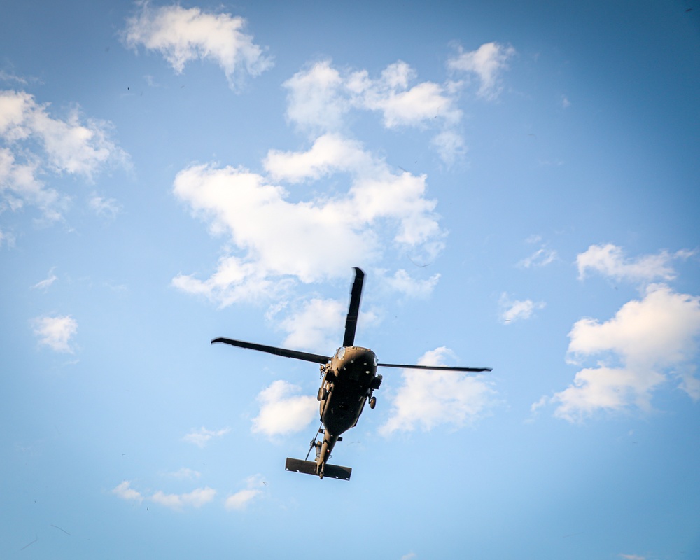 Paratroopers Conduct Load Up Onto Helicopter In Preparation For Air Assault