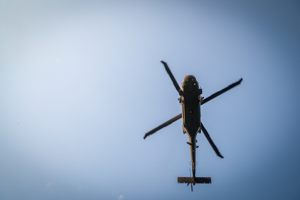 Paratroopers Conduct Load Up Onto Helicopter In Preparation For Air Assault