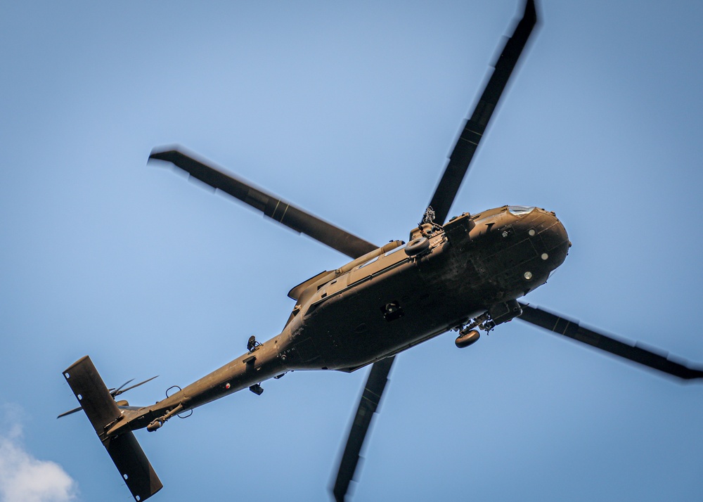 Paratroopers Conduct Load Up Onto Helicopter In Preparation For Air Assault