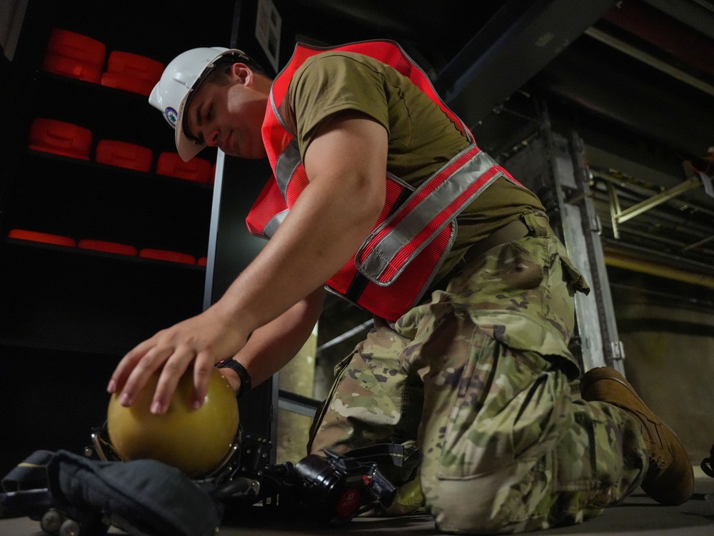 JTF-RH roving security and fire watch team members service SCBA’s at RHBFSF.