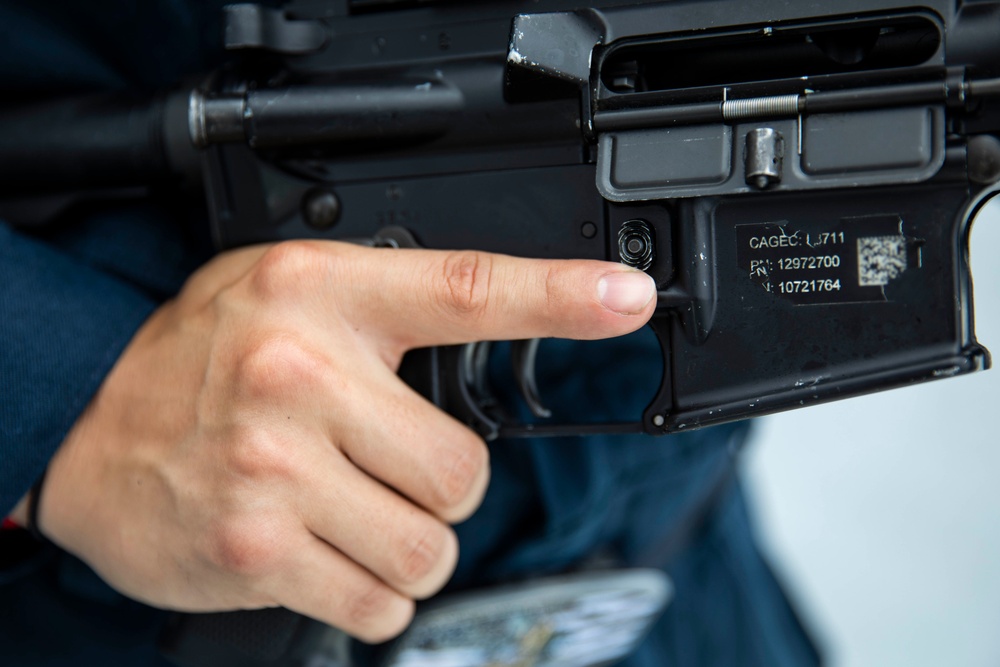 USS Ralph Johnson hosts weapons familiarization training.