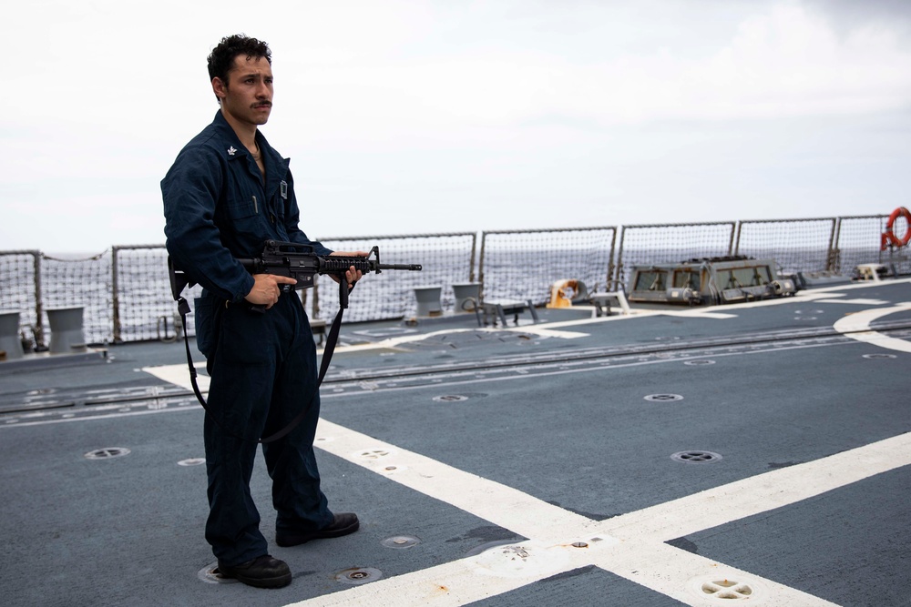 USS Ralph Johnson hosts weapons familiarization training.