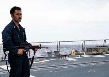 USS Ralph Johnson hosts weapons familiarization training.