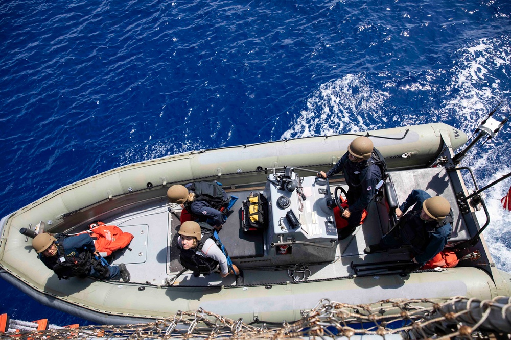 USS Ralph Johnson (DDG 114) conducts a visit, board, search and seizure exercise.