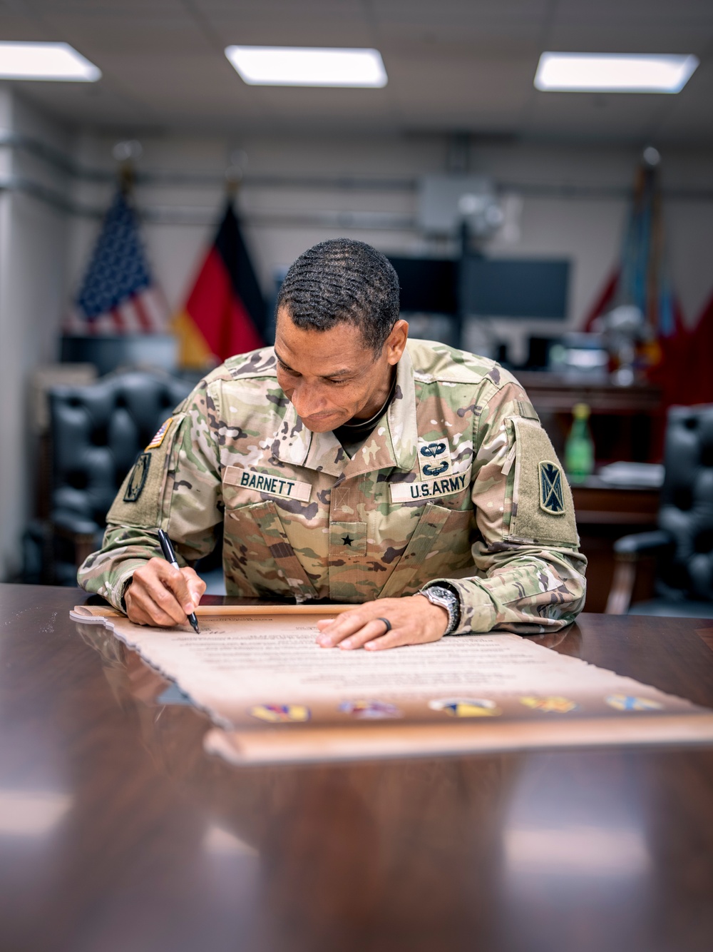 10th AAMDC commanding general signs proclamation for Suicide Prevention Month