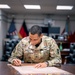 10th AAMDC commanding general signs proclamation for Suicide Prevention Month