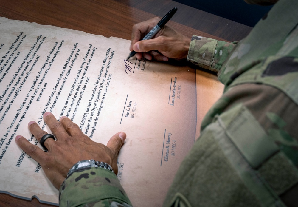 10th AAMDC commanding general signs proclamation for Suicide Prevention Month