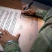 10th AAMDC commanding general signs proclamation for Suicide Prevention Month