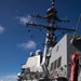 USS Ralph Johnson conducts a replenishment-at-sea with the USNS Matthew Perry.