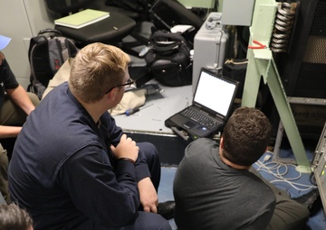 Sailors And Technicians Troubleshoot Systems Onboard