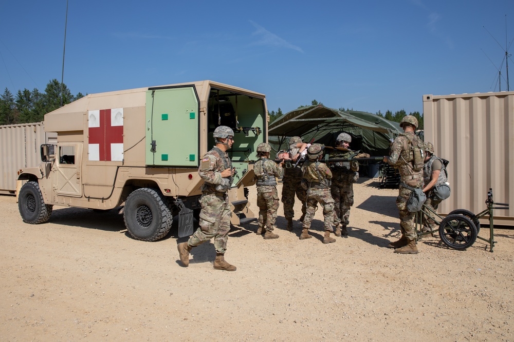 Medical personnel react and treat patients from notional attacks during Combat Support Training Exercise