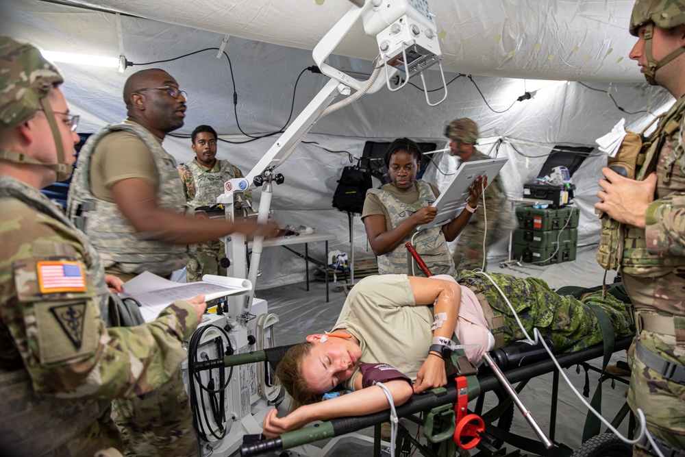 Medical personnel react and treat patients from notional attacks during Combat Support Training Exercise