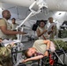 Medical personnel react and treat patients from notional attacks during Combat Support Training Exercise