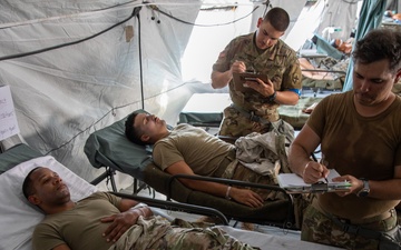 Medical personnel react and treat patients from notional attacks during Combat Support Training Exercise