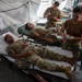 Medical personnel react and treat patients from notional attacks during Combat Support Training Exercise