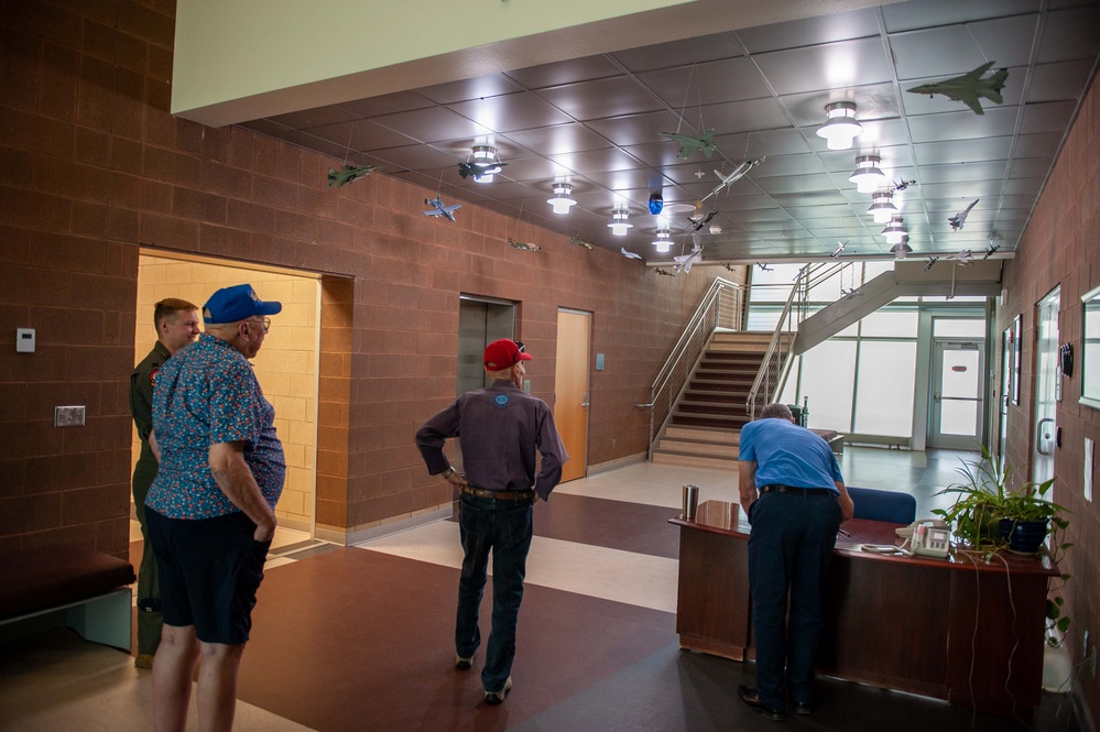 Ellsworth Gives Tour to Mr. Don Peck Donator of many Model Airplanes