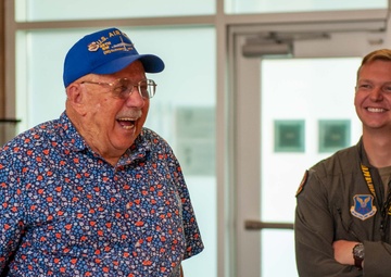 Ellsworth Gives Tour to Mr. Don Peck Donator of many Model Airplanes