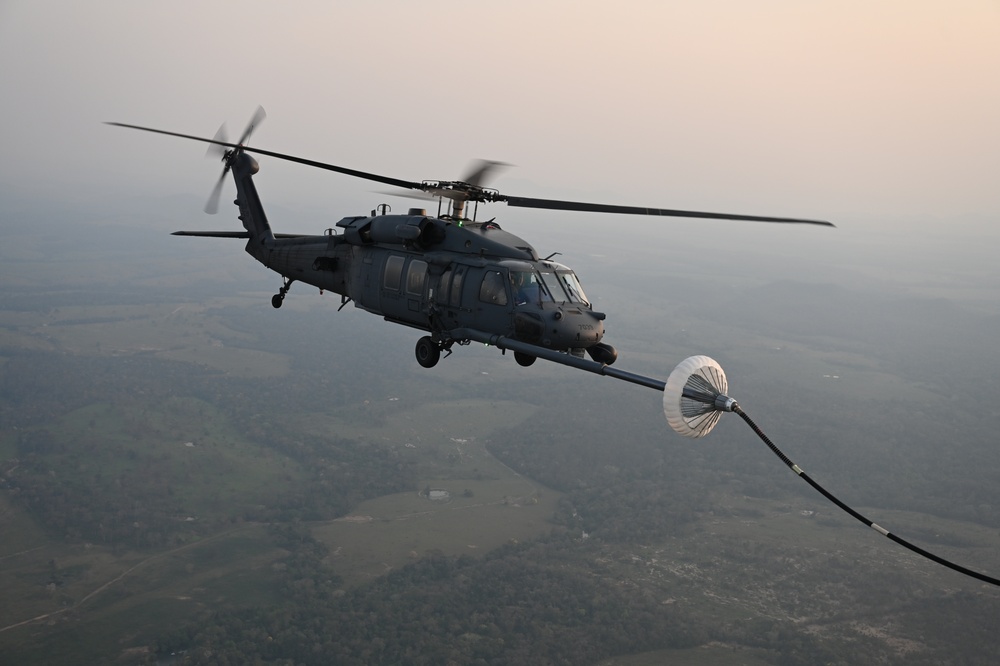 106th Rescue Wing C-130J Refuels HH-60G During Exercise TAPIO