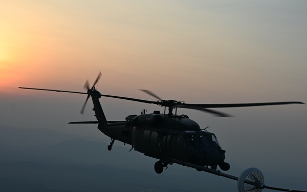 106th Rescue Wing C-130J Refuels HH-60G During Exercise TAPIO
