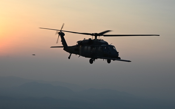 106th Rescue Wing C-130J Refuels HH-60G During Exercise TAPIO
