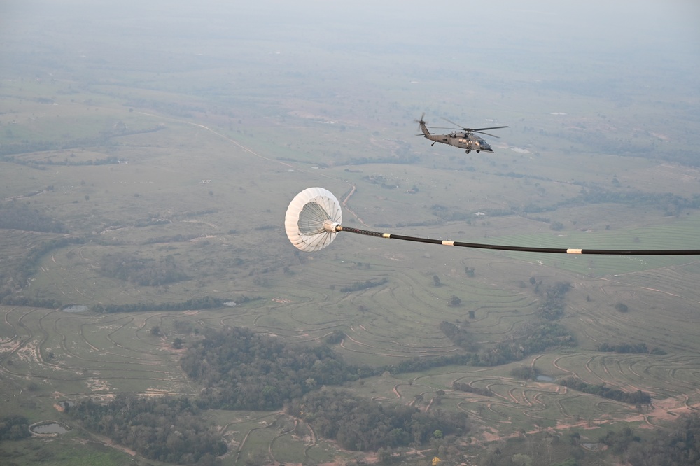106th Rescue Wing C-130J Refuels HH-60G During Exercise TAPIO