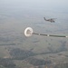 106th Rescue Wing C-130J Refuels HH-60G During Exercise TAPIO
