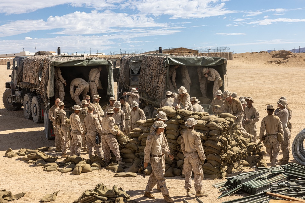 Marines with 3/7, 1st Combat Engineer Battalion defend an urban environment during AFX 5-23