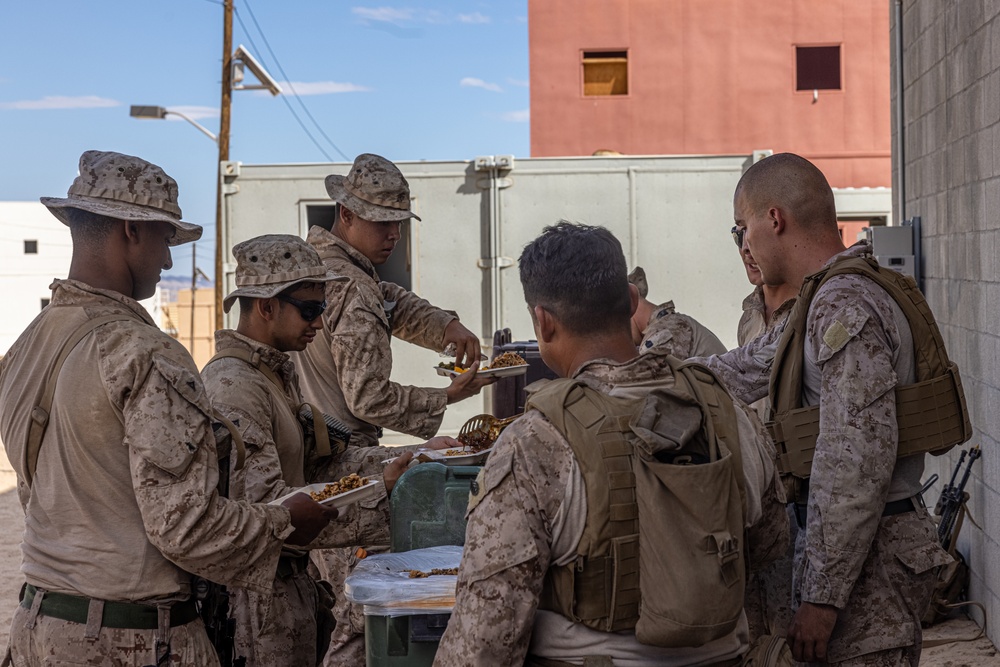 Marines with 3/7, 1st Combat Engineer Battalion defend an urban environment during AFX 5-23