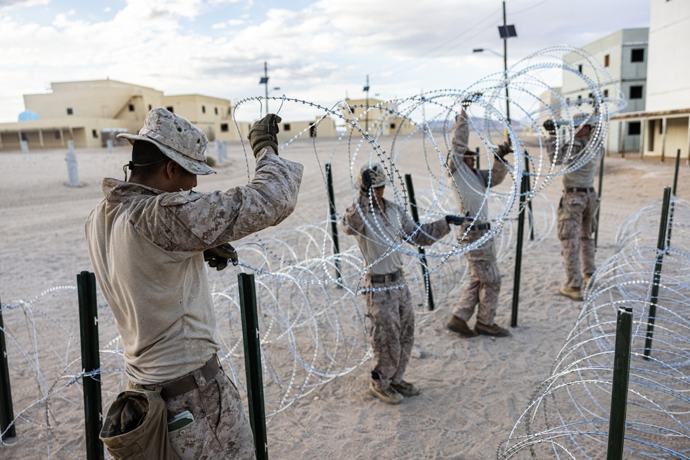 Marines with 3/7, 1st Combat Engineer Battalion defend an urban environment during AFX 5-23