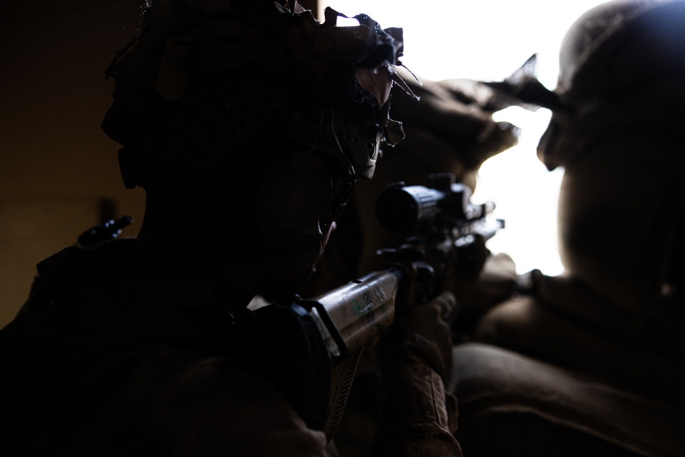 Marines with 3/7, 1st Combat Engineer Battalion defend an urban environment during AFX 5-23