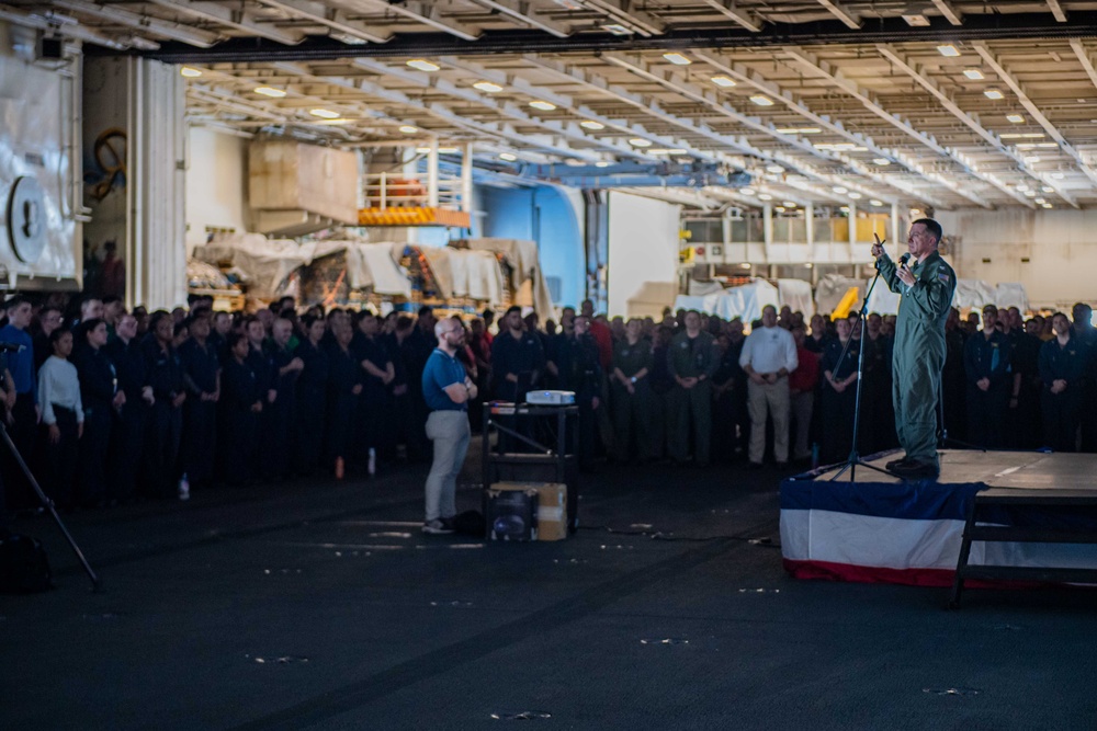 USS Ronald Reagan (CVN 76) holds an all-hands call