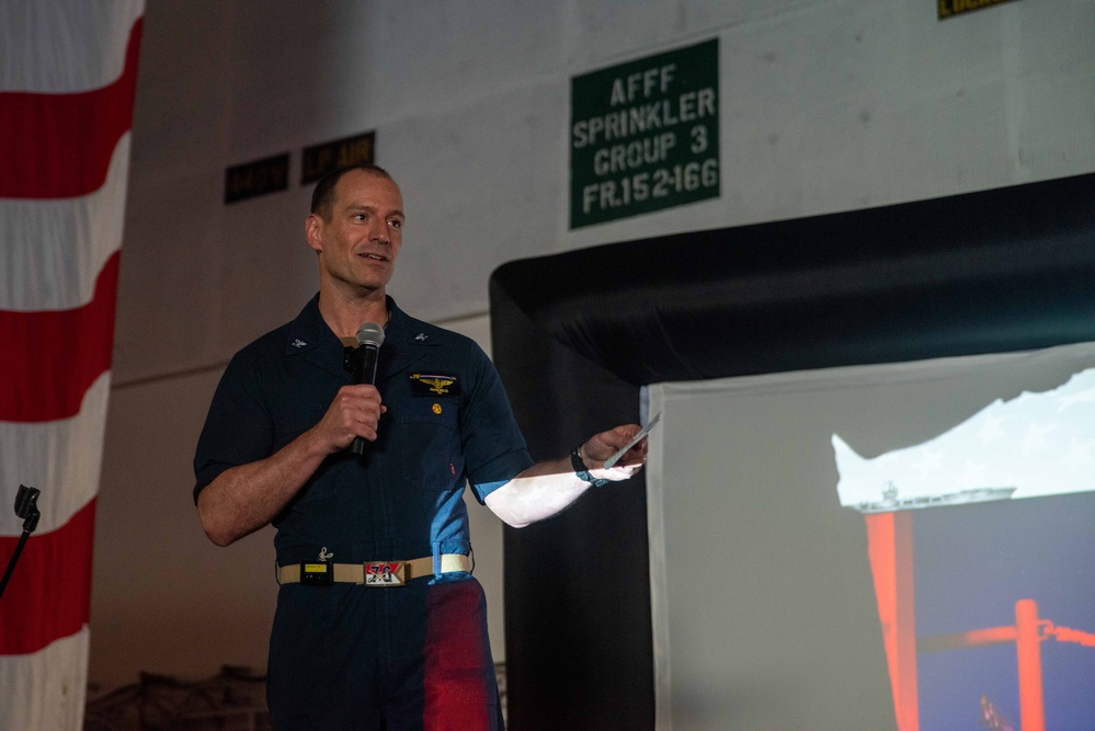 USS Ronald Reagan (CVN 76) holds an all-hands call