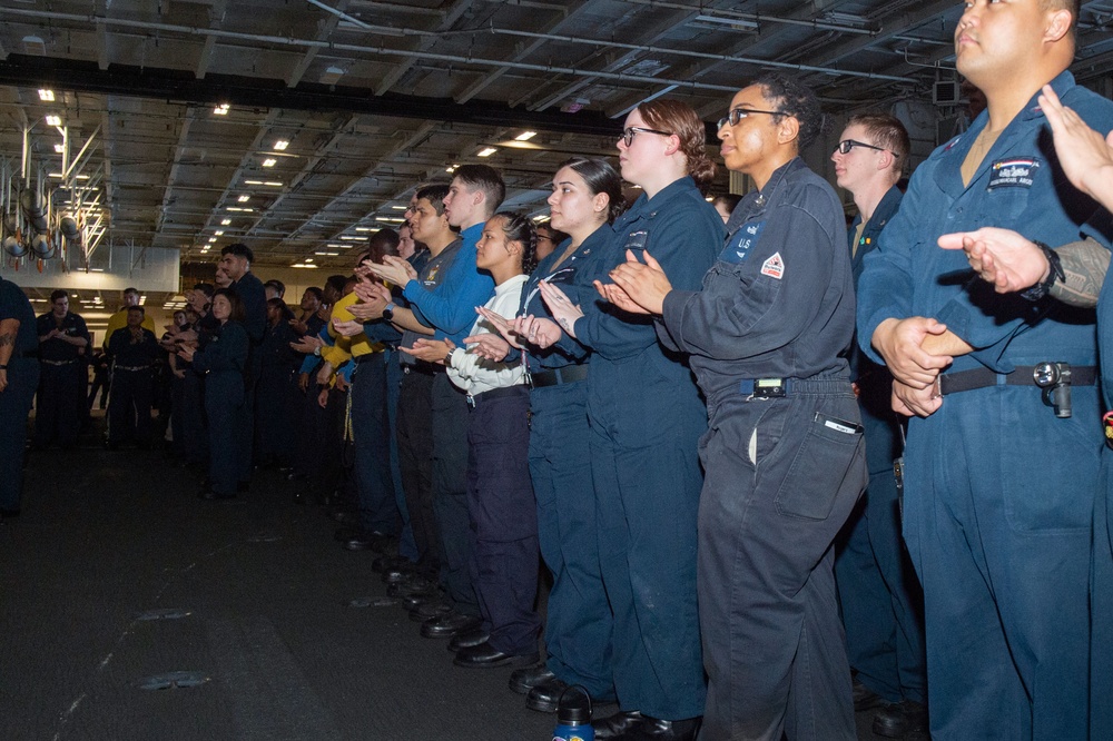 USS Ronald Reagan (CVN 76) holds an all-hands call