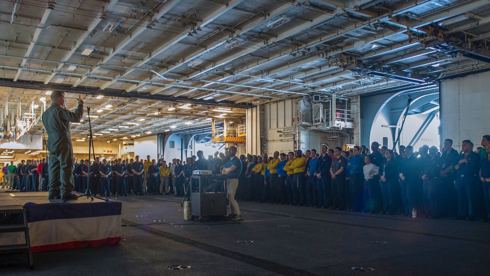 USS Ronald Reagan (CVN 76) holds an all-hands call