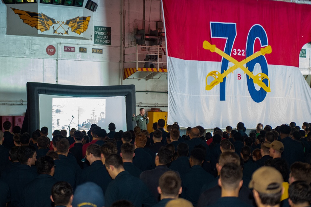 USS Ronald Reagan (CVN 76) holds an all-hands call