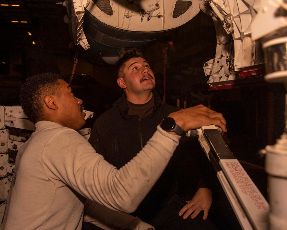 Sailors Perform an Inspection Aboard USS Carl Vinson (CVN 70)