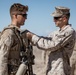 3/4 Marine receives achievement award while in the field