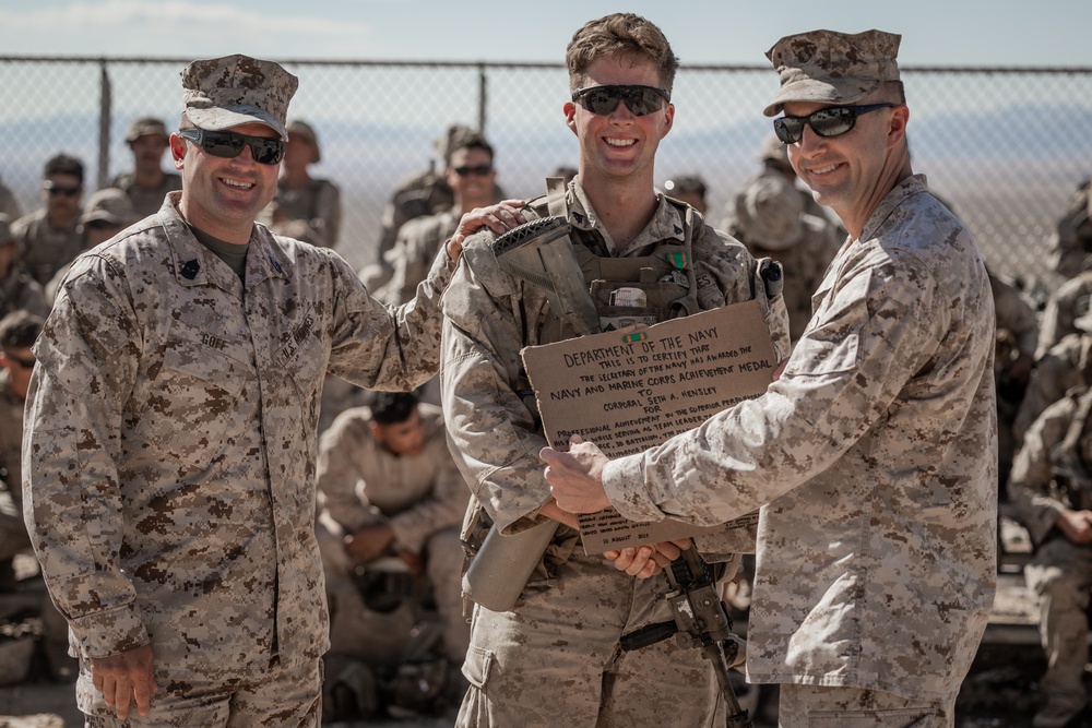 3/4 Marine receives achievement award while in the field