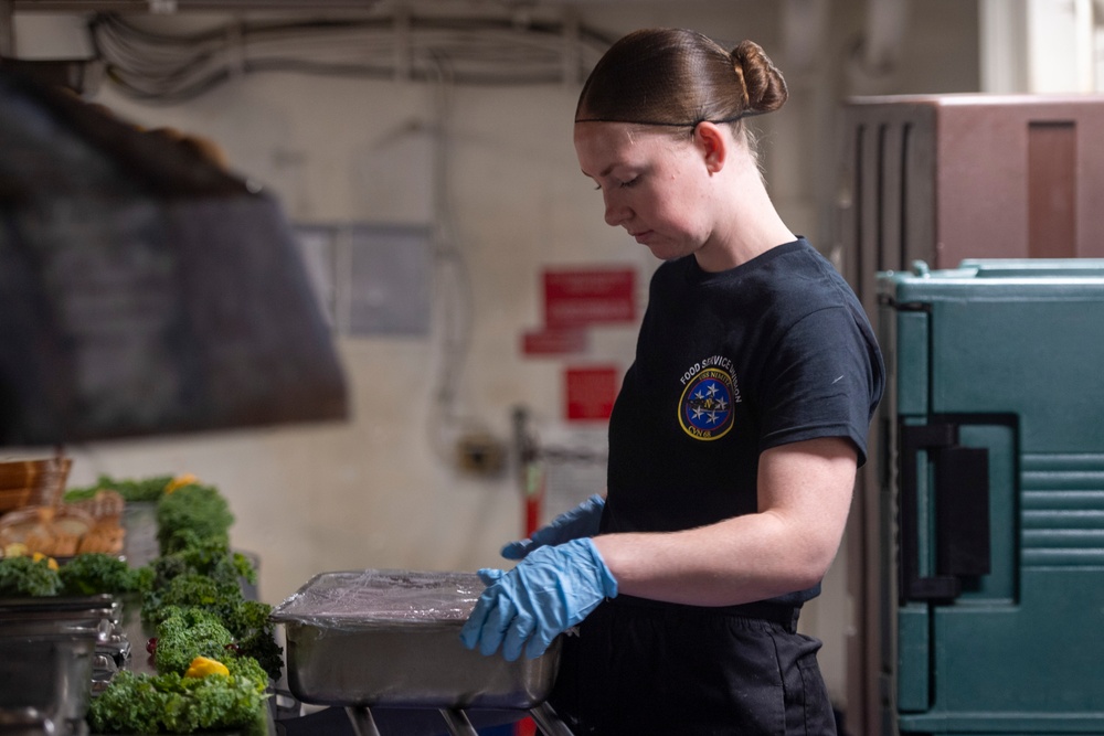 U.S. Navy Sailor Prepares Food