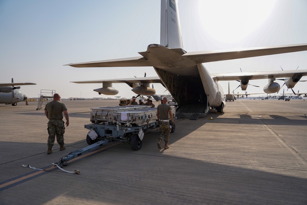 378th ELRS and RSAF load C-130 in preparation for Operation Agile Spartan