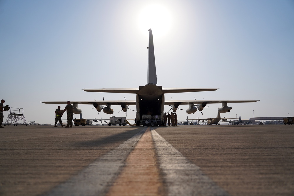 378th ELRS and RSAF load C-130 in preparation for Operation Agile Spartan